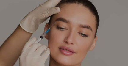 Image of a female lady undergoing botox treatment