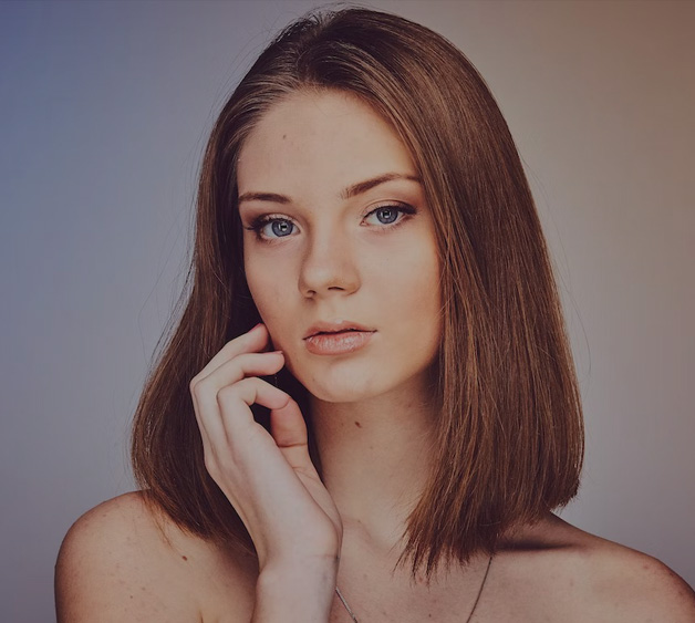 Image of a female model face front side