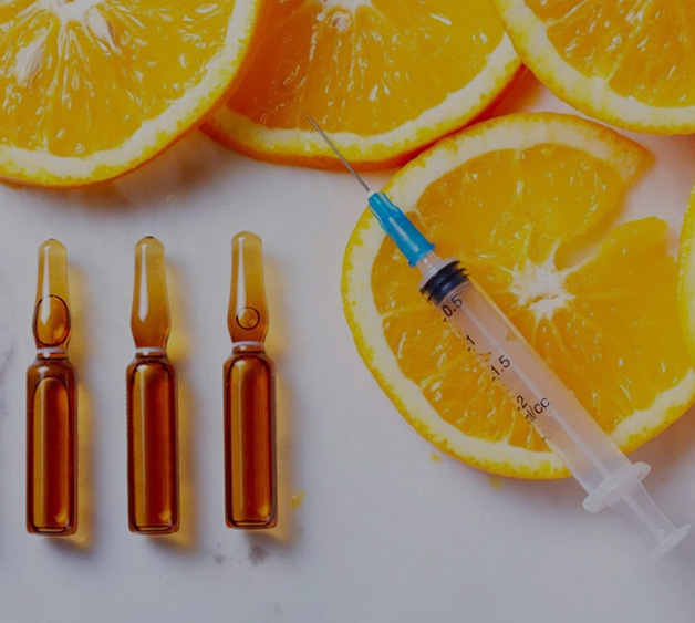 Image showing vitamin shots orange peels and syringe