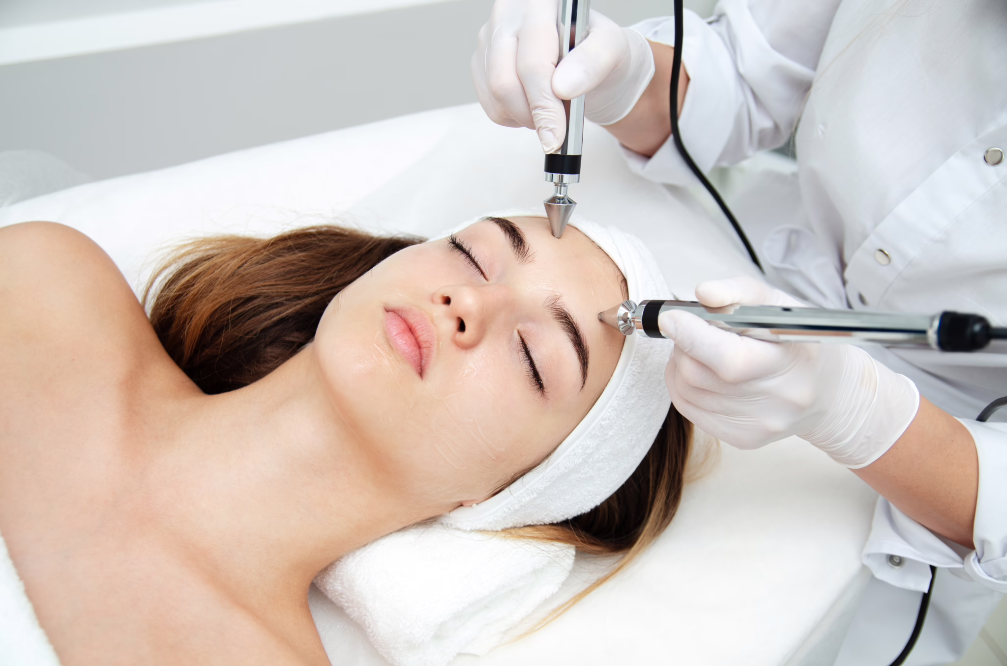 Woman enjoying med spa membership facial treatment at Mirror Mirror Med Spa